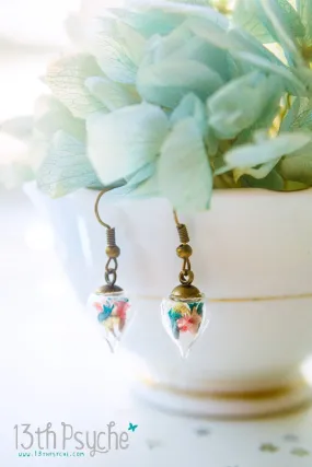 Glass teardrop earrings with real dried flowers