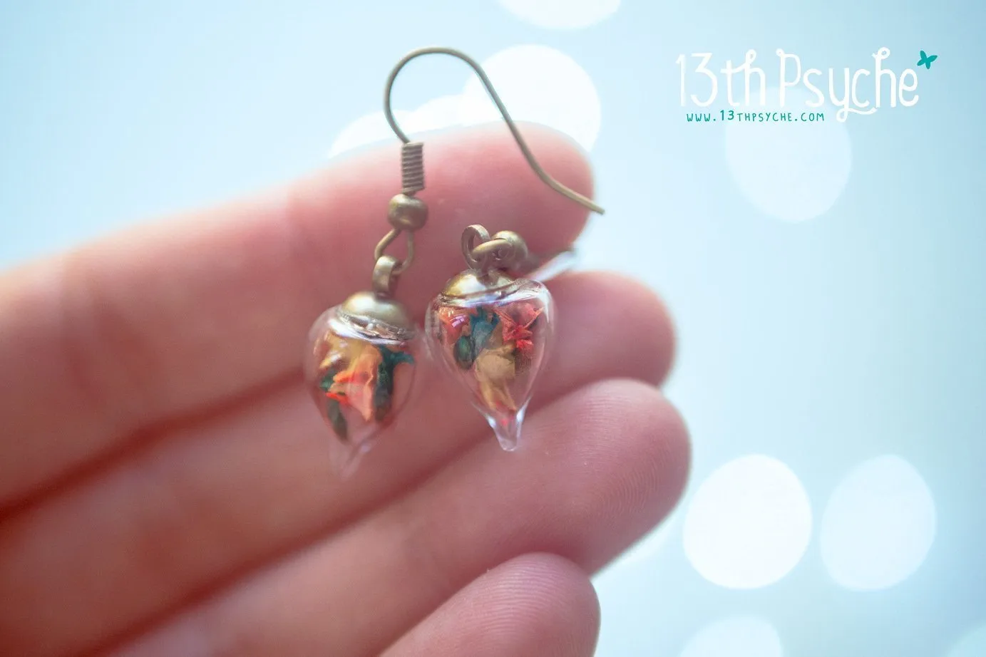 Glass teardrop earrings with real dried flowers