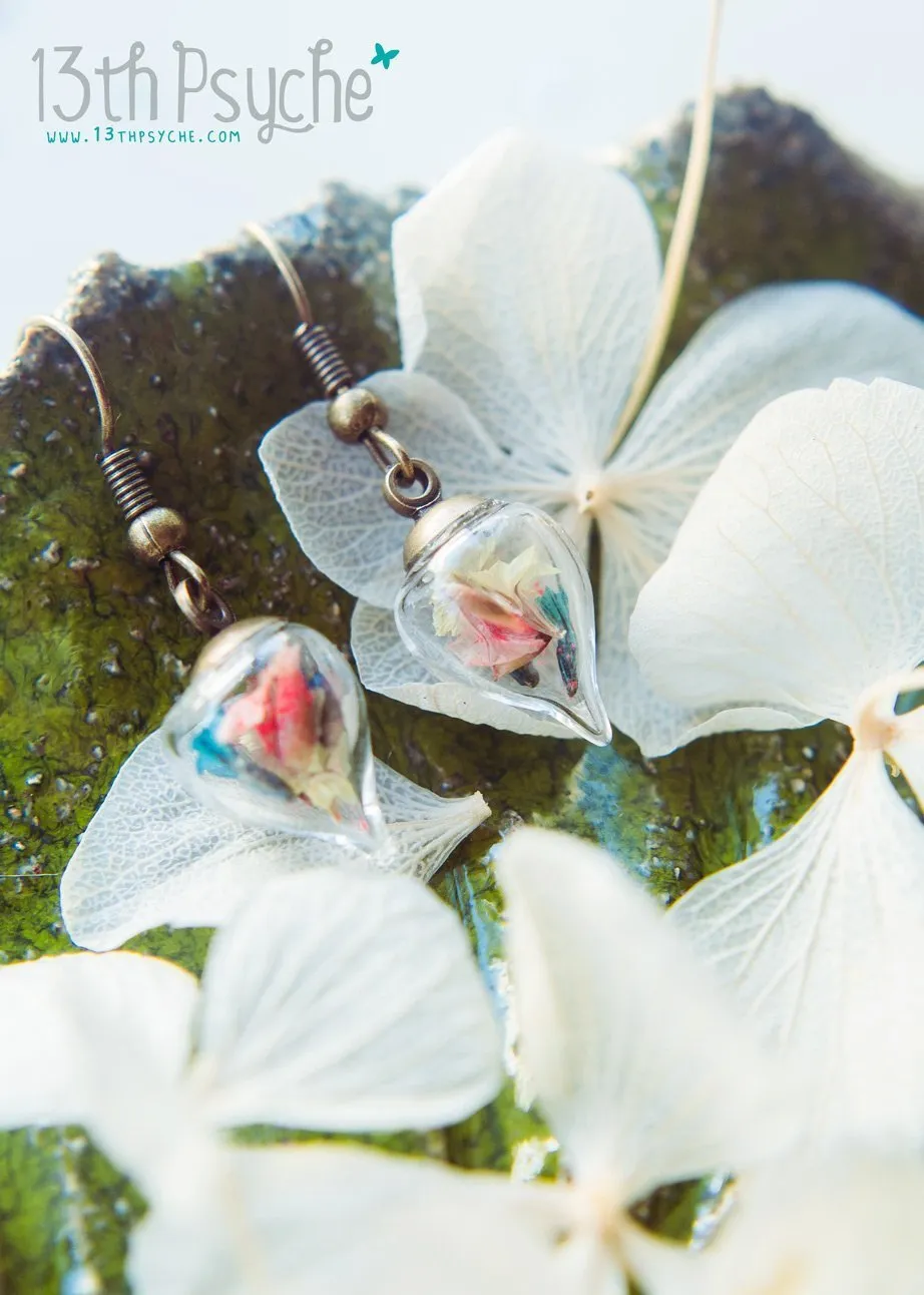 Glass teardrop earrings with real dried flowers