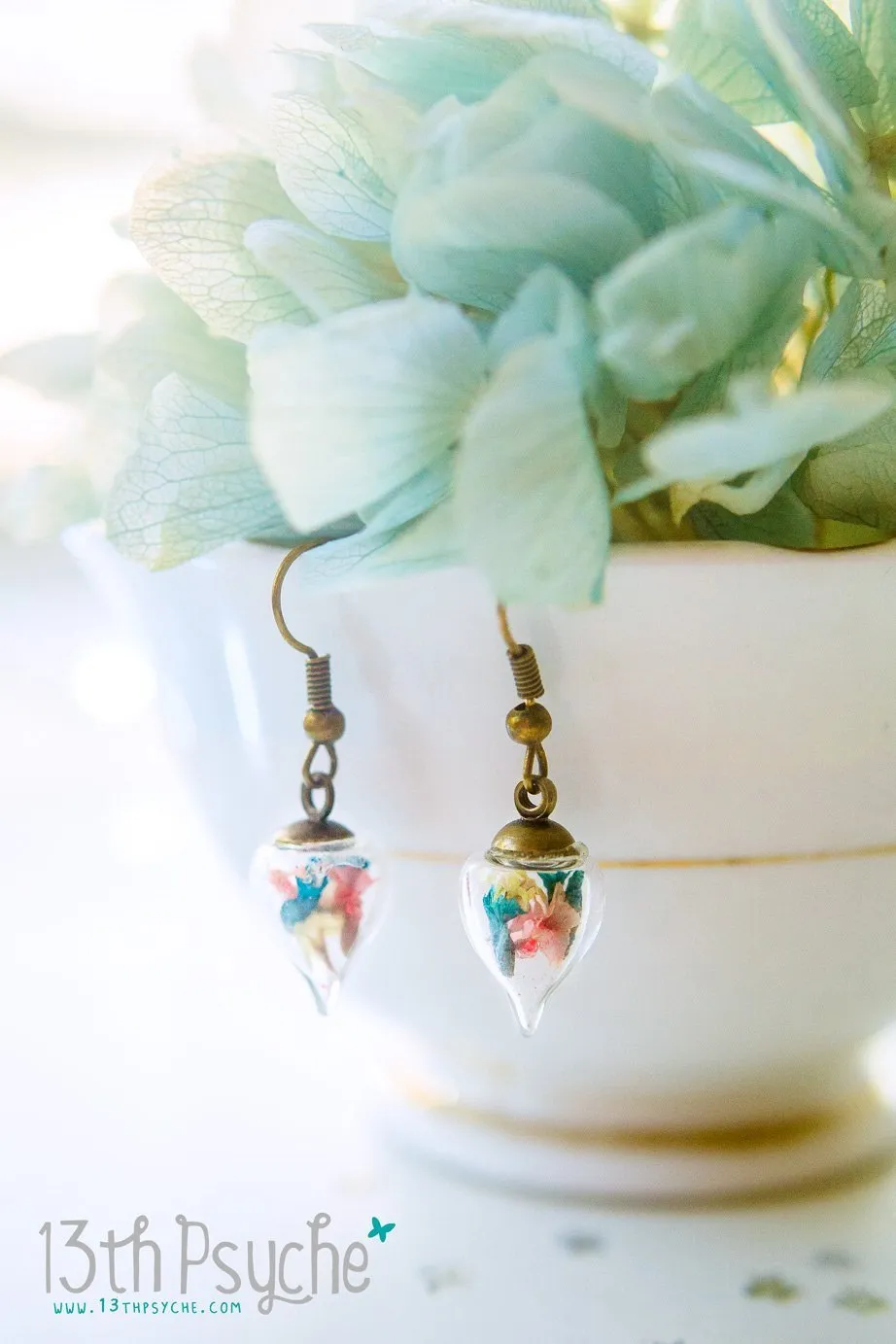 Glass teardrop earrings with real dried flowers