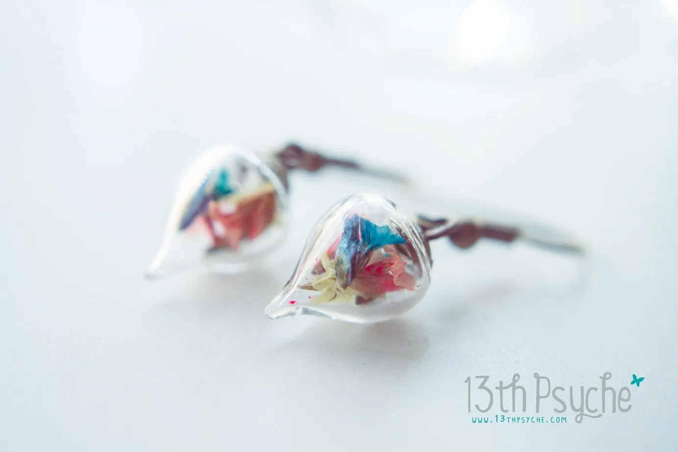 Glass teardrop earrings with real dried flowers