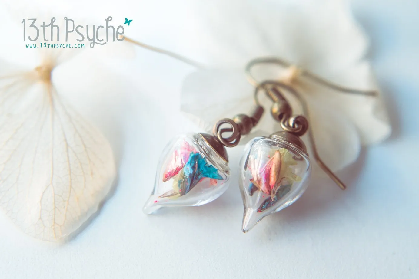 Glass teardrop earrings with real dried flowers