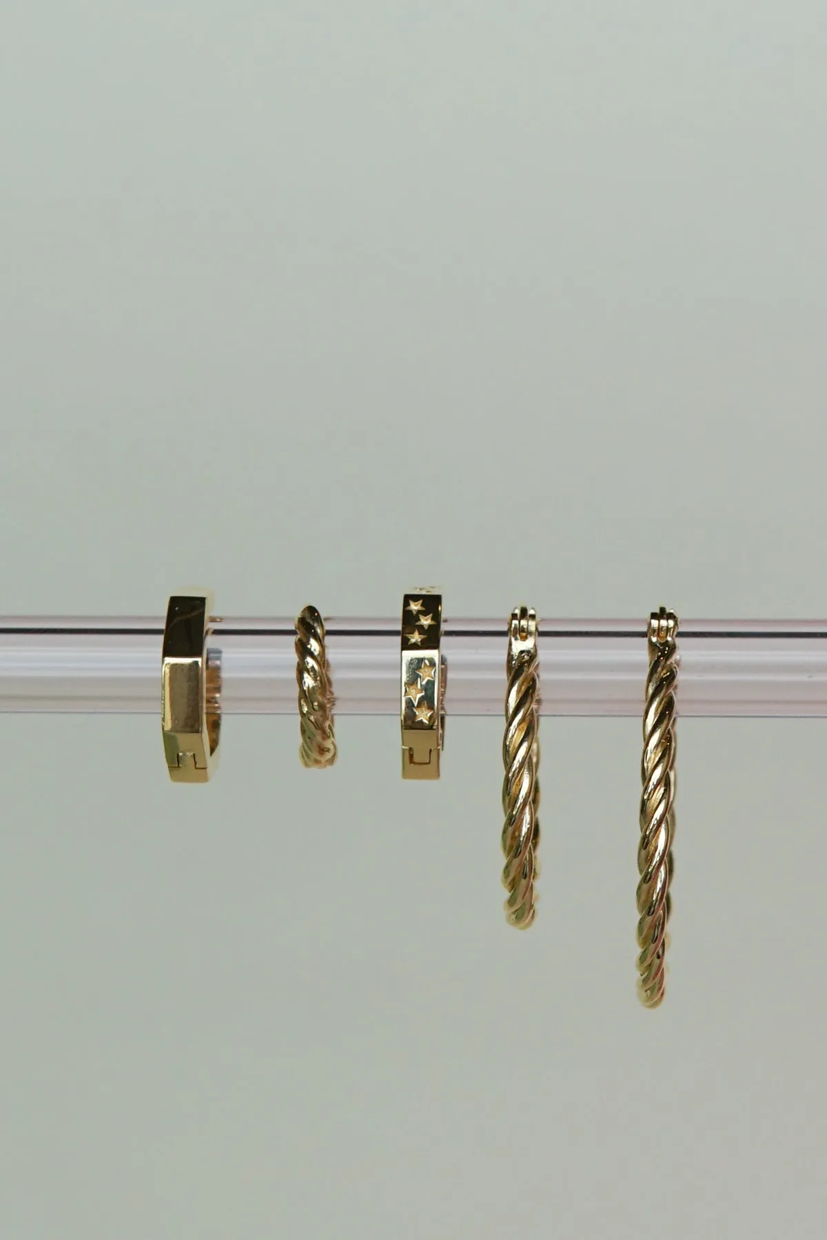 Twisted croissant hoop earring gold plated 13mm