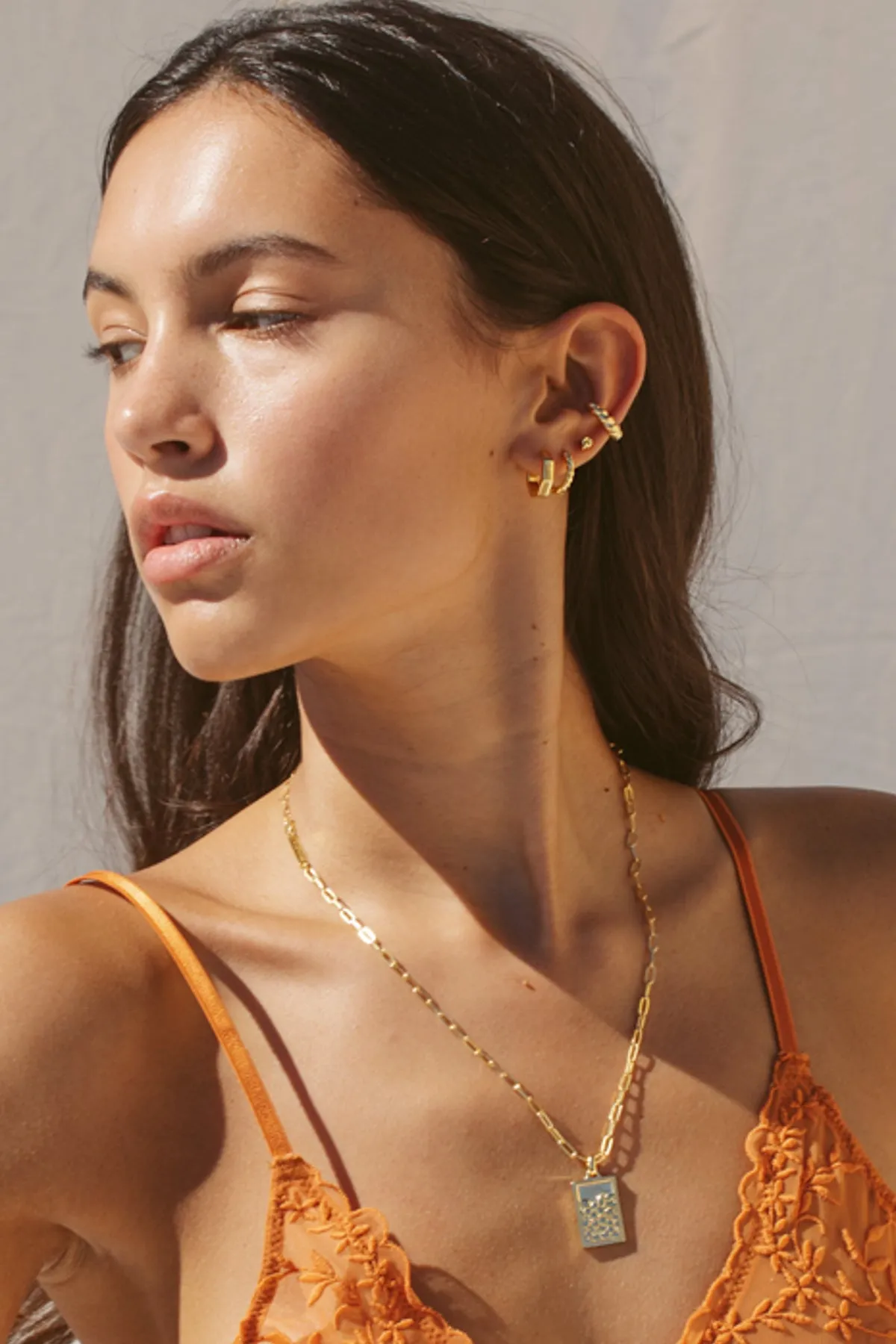 Twisted croissant hoop earring gold plated 13mm